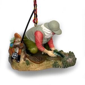 Santa Flying Fish Christmas Ornament An Otter Is Helping Him 3 x 2 Inches